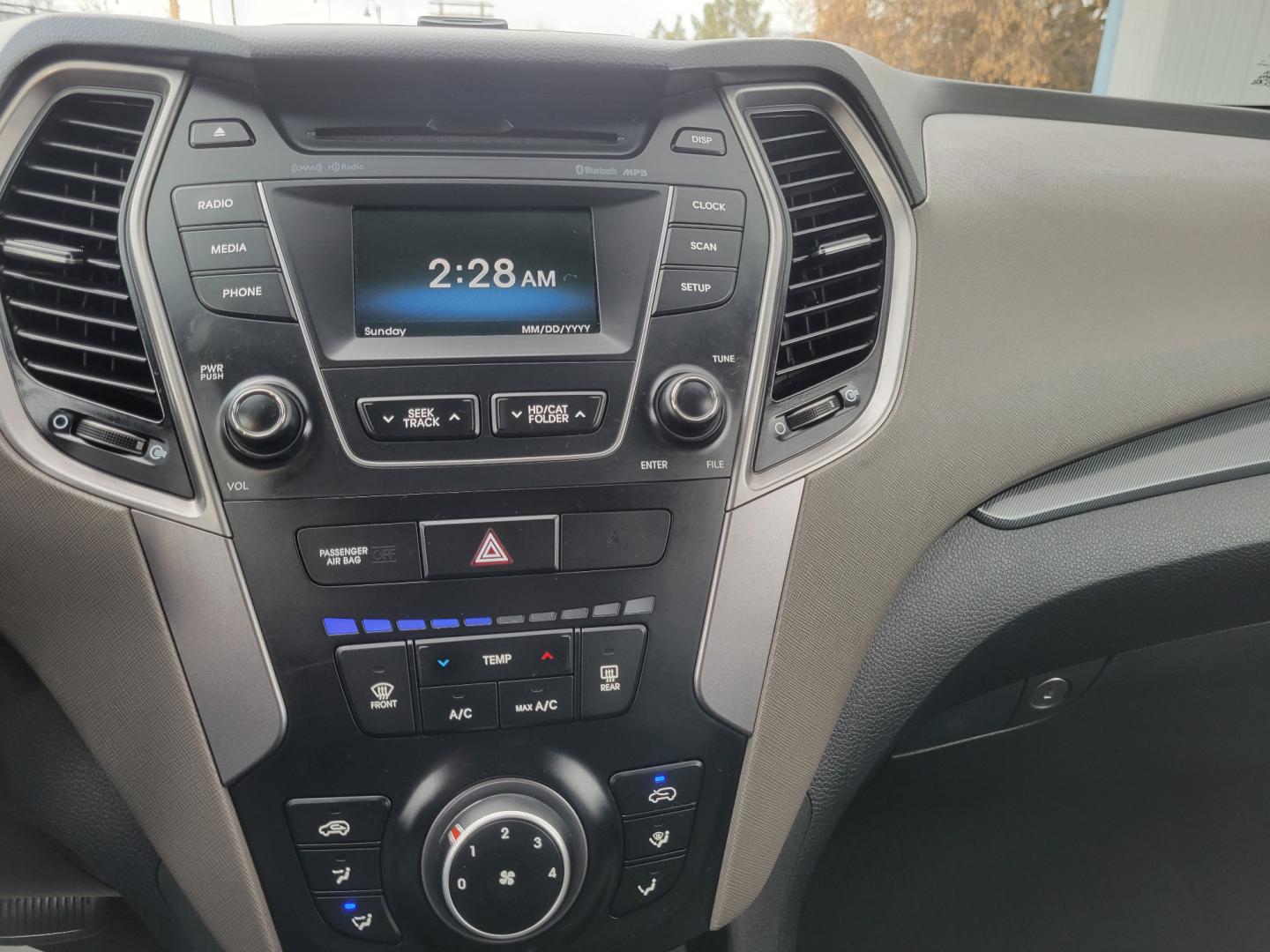 2016 Blue /Tan Hyundai Santa Fe Sport (5XYZUDLB6GG) with an 2.4L I4 engine, 6 Speed Automatic transmission, located at 450 N Russell, Missoula, MT, 59801, (406) 543-6600, 46.874496, -114.017433 - One Owner. Clean Carfax. Heated Seats. Towing. Air. Cruise. Tilt. Backup Camera. Power Windows and Locks. AM FM Bluetooth. - Photo#18